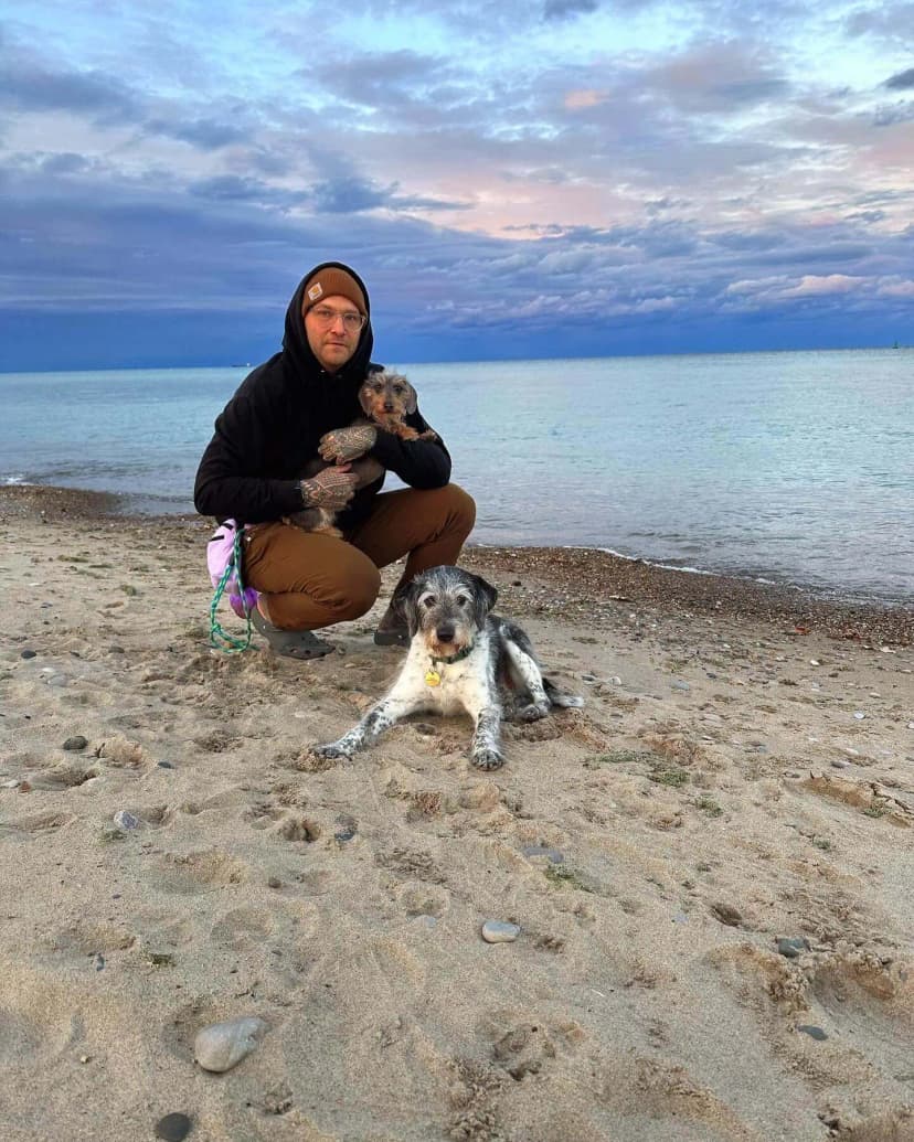 Kevin and his dogs on Lake Huron